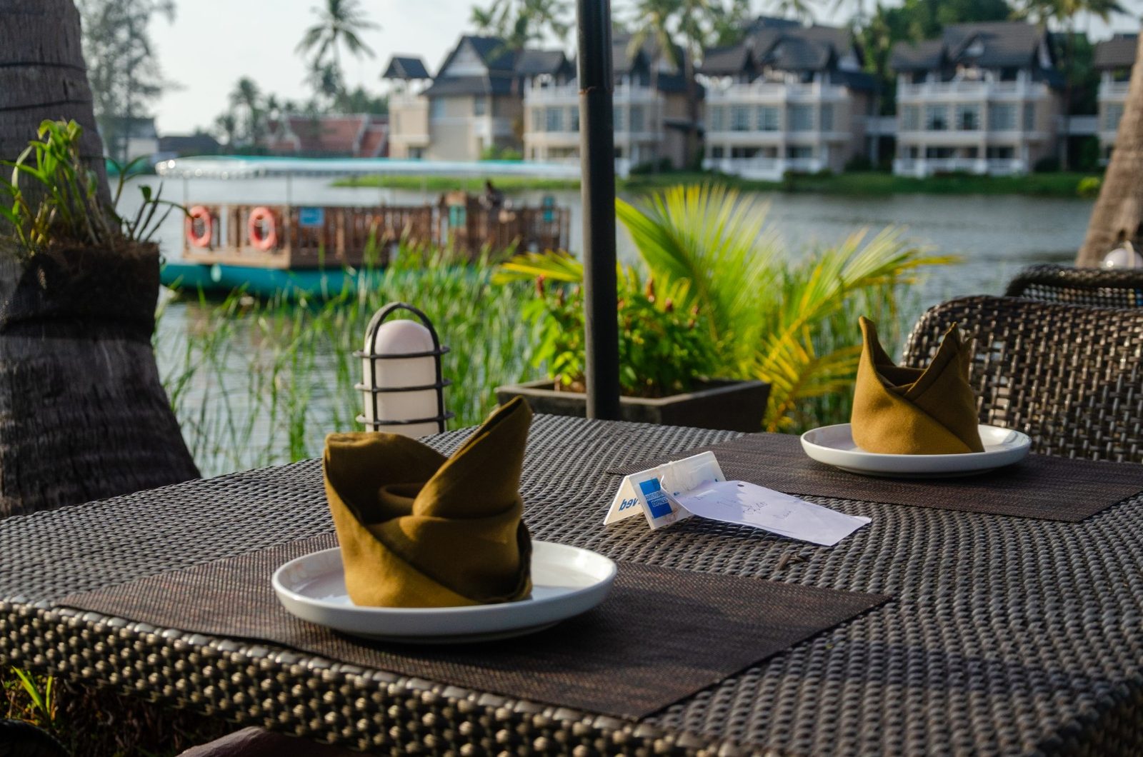 Table set by the lake at Albatross Café