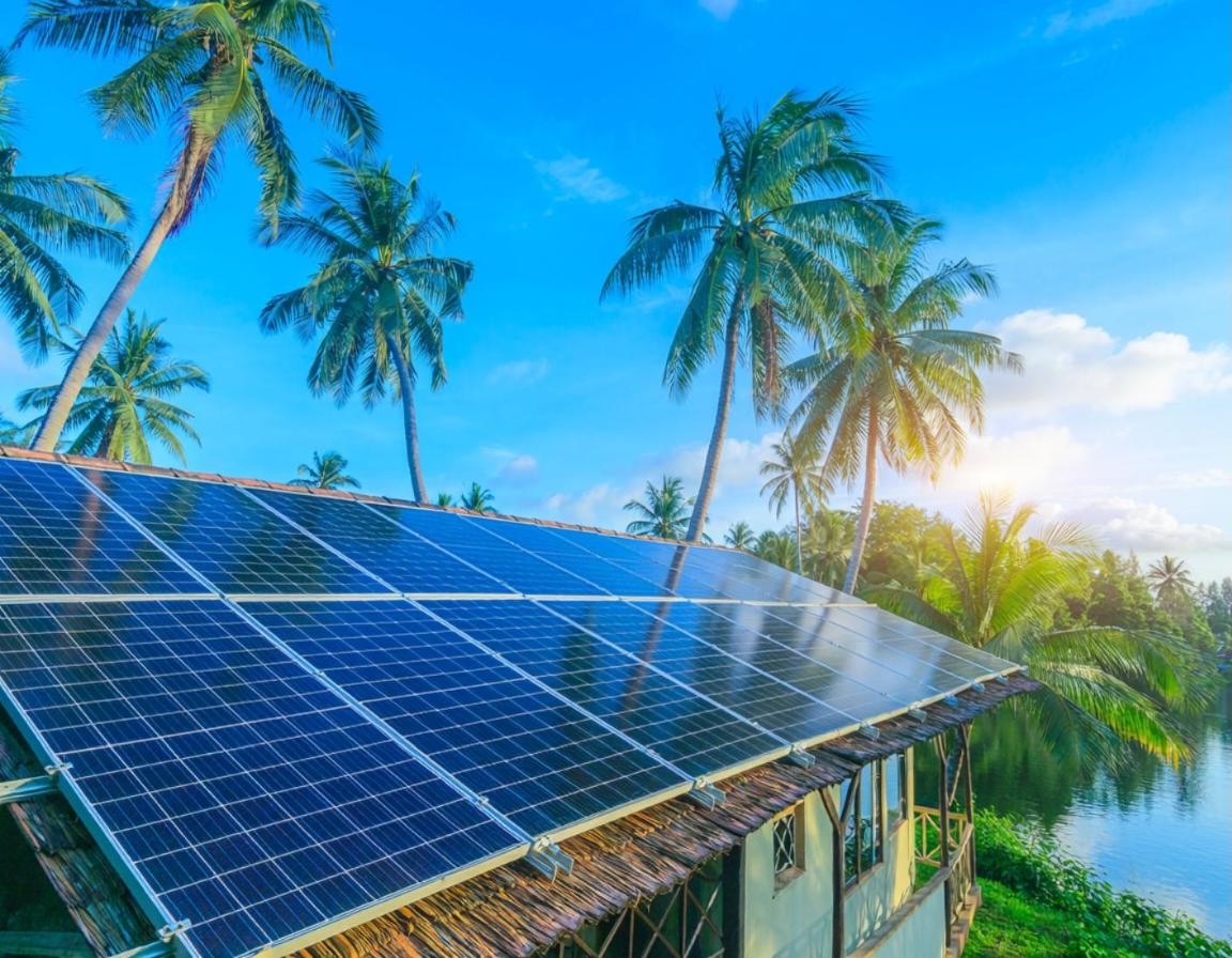 Solar panels on a tropical restaurant roof by the lake (illustration)